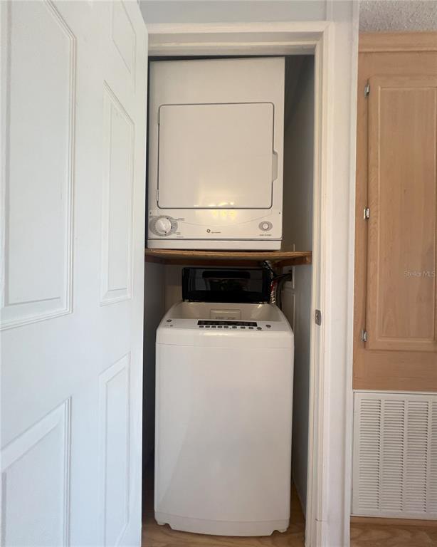 1202 Snook Punta Gorda, FL 33950 - Photo 17 of 34 a utility room with dryer and washer