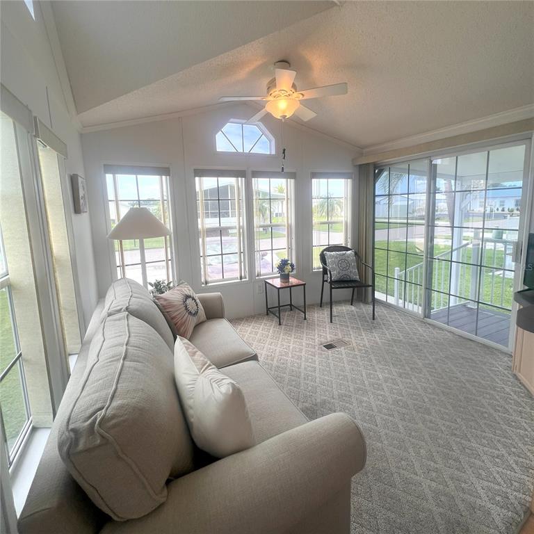 1202 Snook Punta Gorda, FL 33950 - Photo 4 of 34 a living room with furniture and a large window