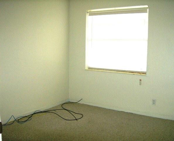 2301 Southwest 50th Terrace Plantation, FL 33317 - Photo 23 of 26 view of a room with a window and a fan