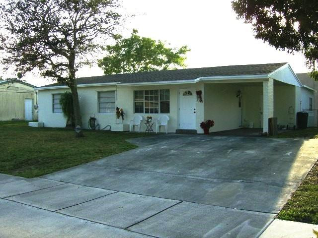 2301 Southwest 50th Terrace Plantation, FL 33317 - Photo 3 of 26 a front view of house with yard