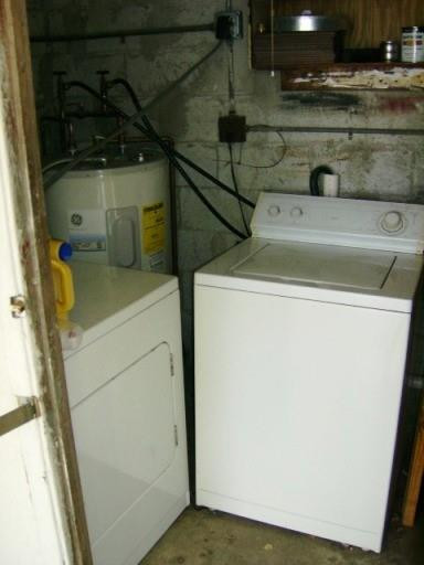 2301 Southwest 50th Terrace Plantation, FL 33317 - Photo 6 of 26 a utility room with dryer and washer