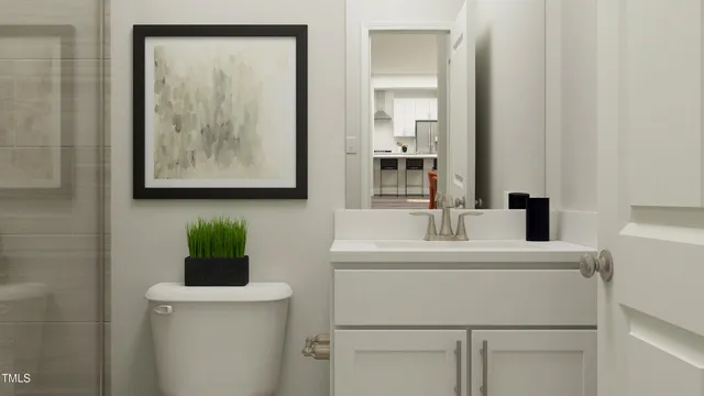 a bathroom with a glass shower door