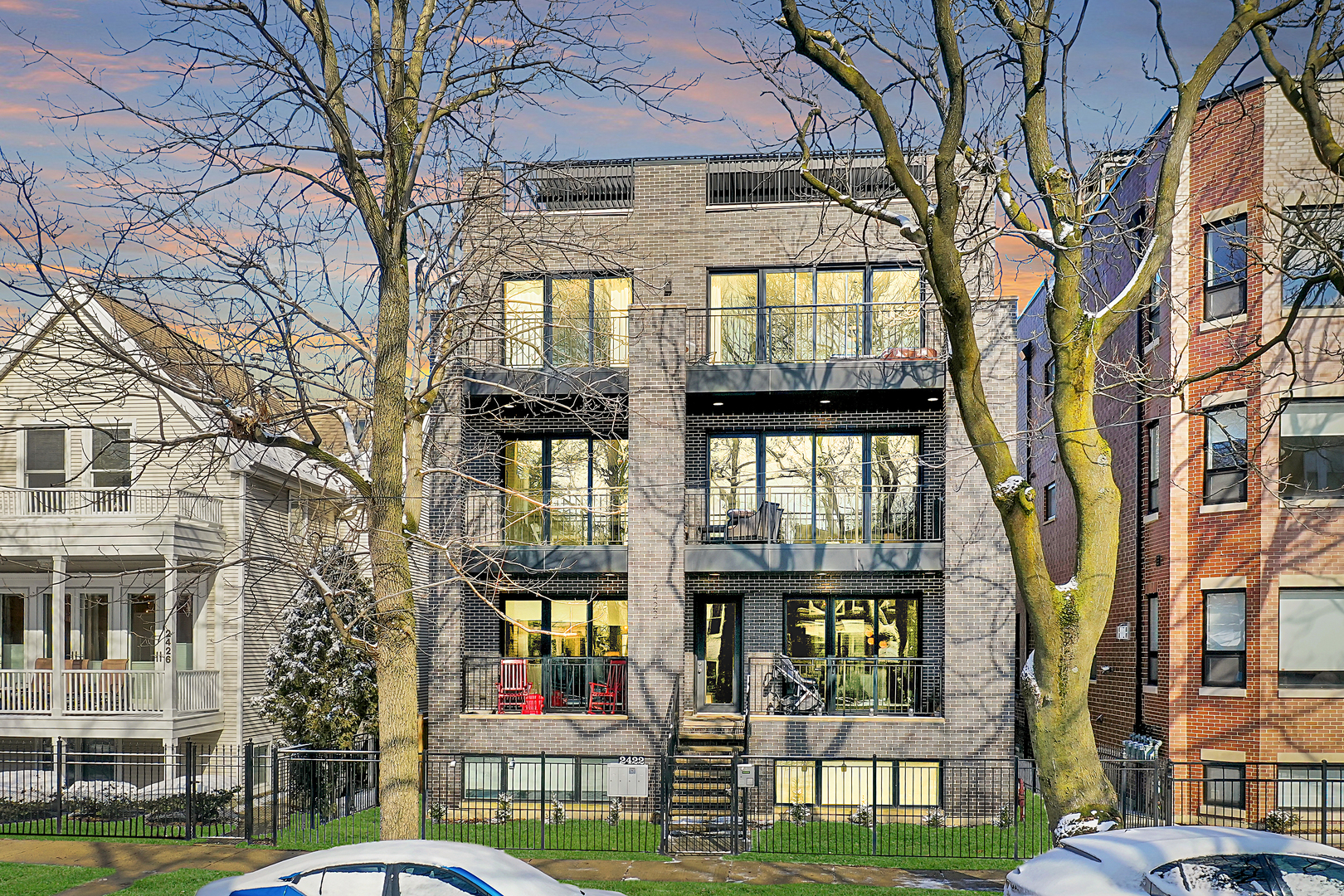 2422 West Lyndale Street, Unit 1W Chicago, IL 60647 - Photo 1 of 24 a front view of a building with a garden