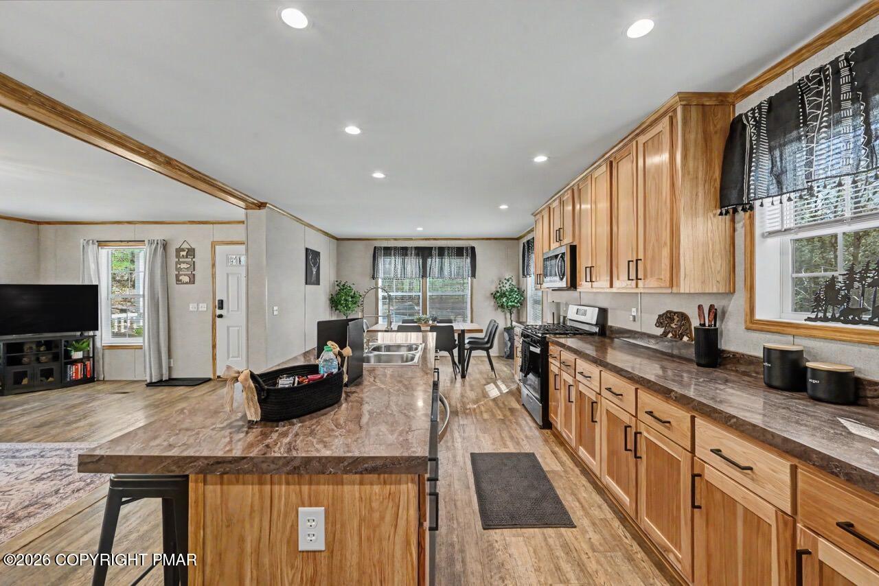 2194 Snow Hill Falls Road Cresco, PA 18326 - Photo 29 of 63 a large kitchen with granite countertop lots of counter space and windows