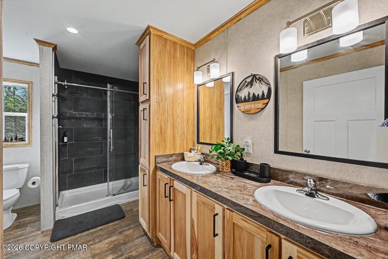 2194 Snow Hill Falls Road Cresco, PA 18326 - Photo 44 of 63 a bathroom with a sink double vanity and a shower