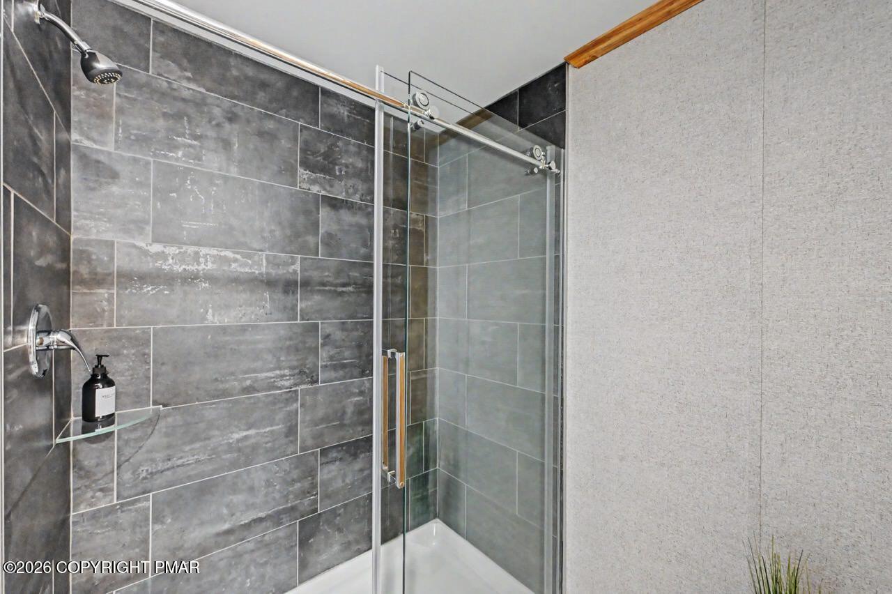 2194 Snow Hill Falls Road Cresco, PA 18326 - Photo 46 of 63 a bathroom with a shower