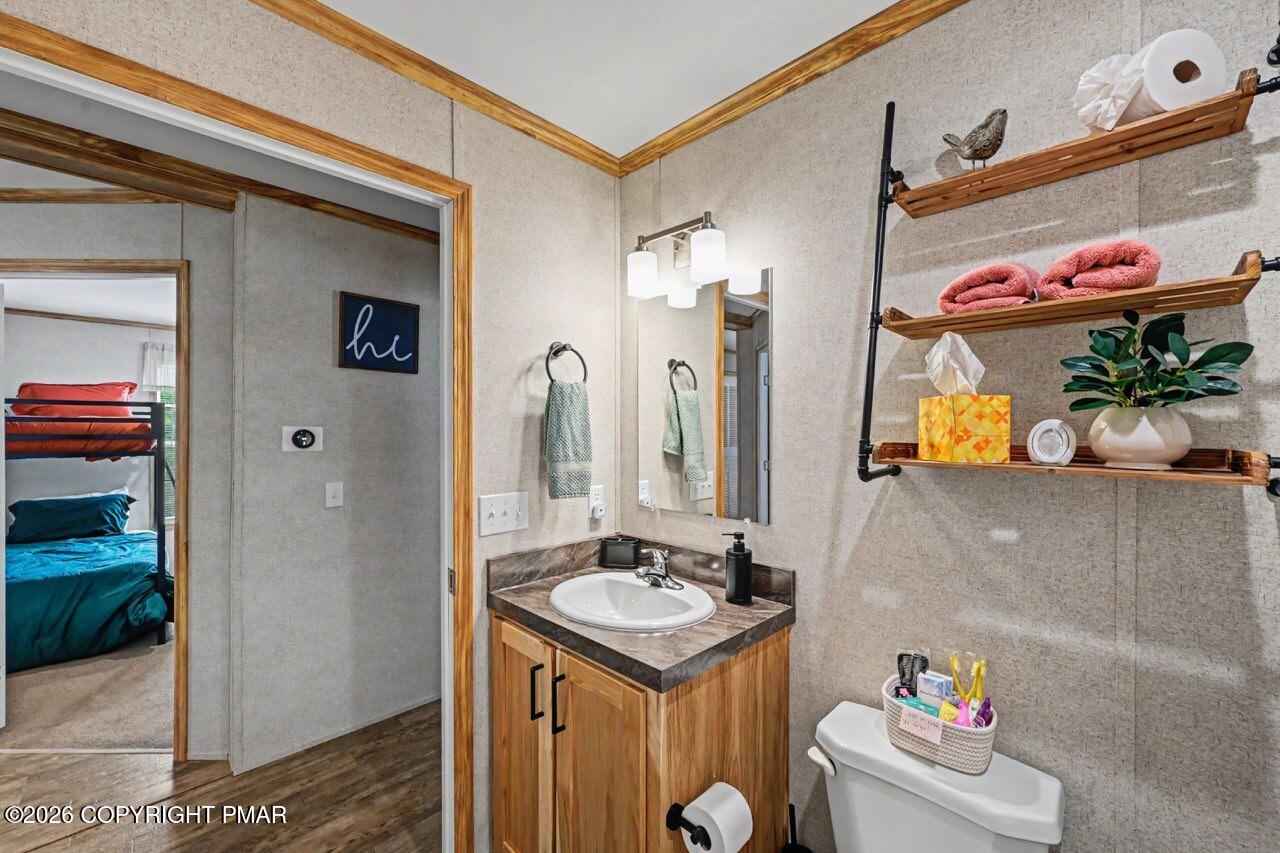 2194 Snow Hill Falls Road Cresco, PA 18326 - Photo 52 of 63 a bathroom with a sink mirror and vanity