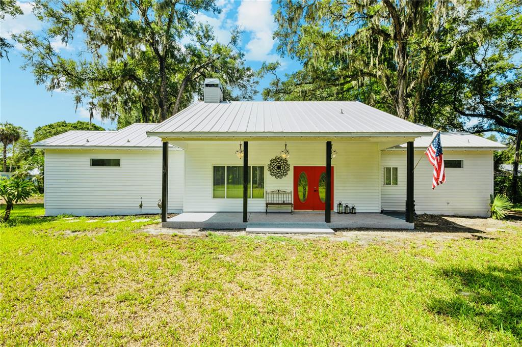 a house with yard in front of it