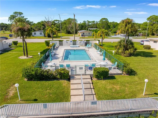 a view of a swimming pool with a patio