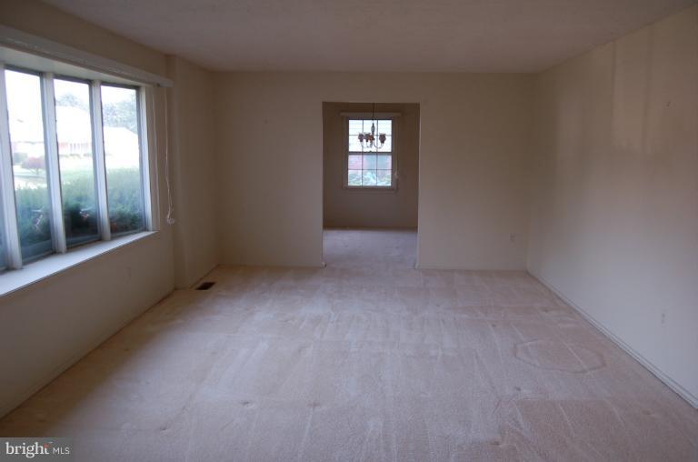 18916 Olney Mill Road Olney, MD 20832 - Photo 1 of 24 an empty room that has a window