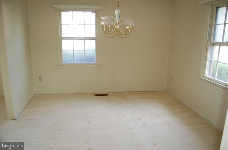18916 Olney Mill Road Olney, MD 20832 - Photo 13 of 24 an empty room with a window
