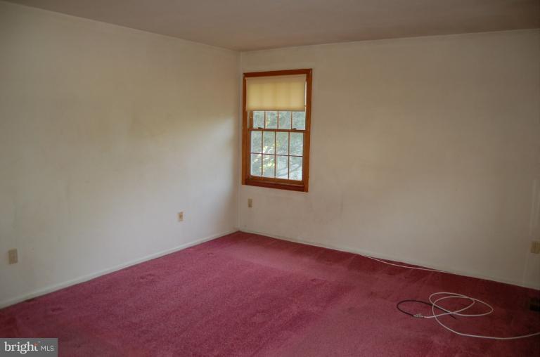 18916 Olney Mill Road Olney, MD 20832 - Photo 18 of 24 an empty room with a window