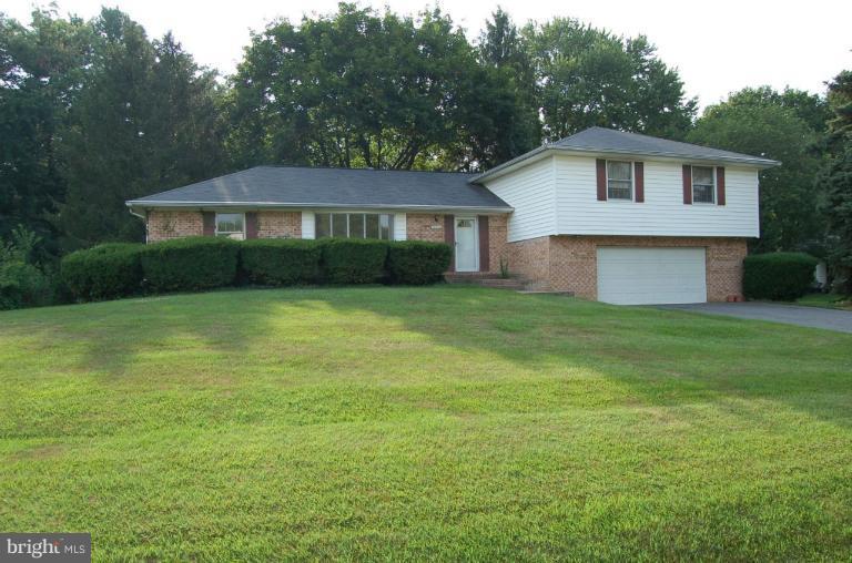 18916 Olney Mill Road Olney, MD 20832 - Photo 24 of 24 a view of a house with a yard