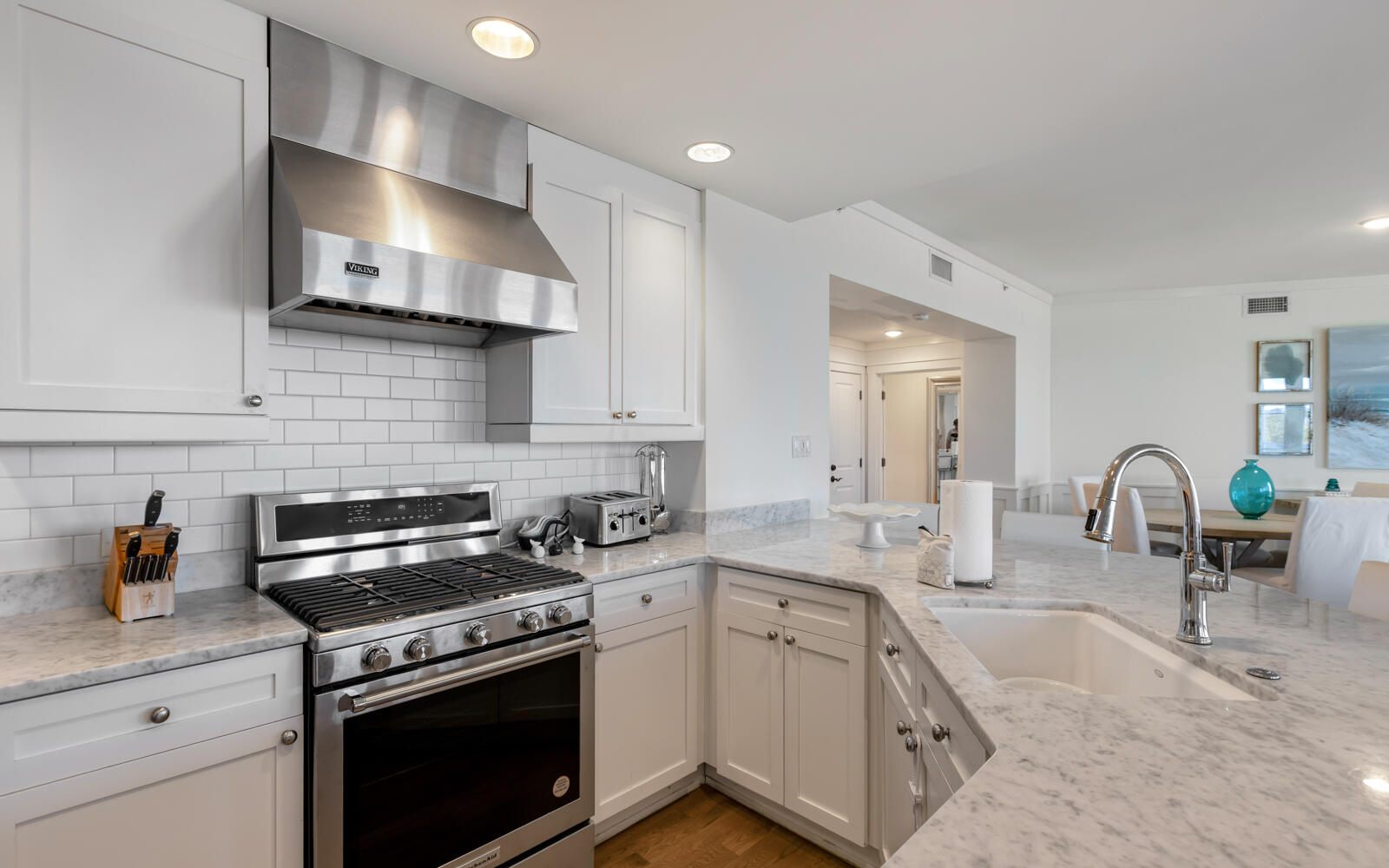 100 Bridge Lane, Unit 214C Inlet Beach, FL 32461 - Photo 15 of 54 a kitchen with a sink stove and cabinets
