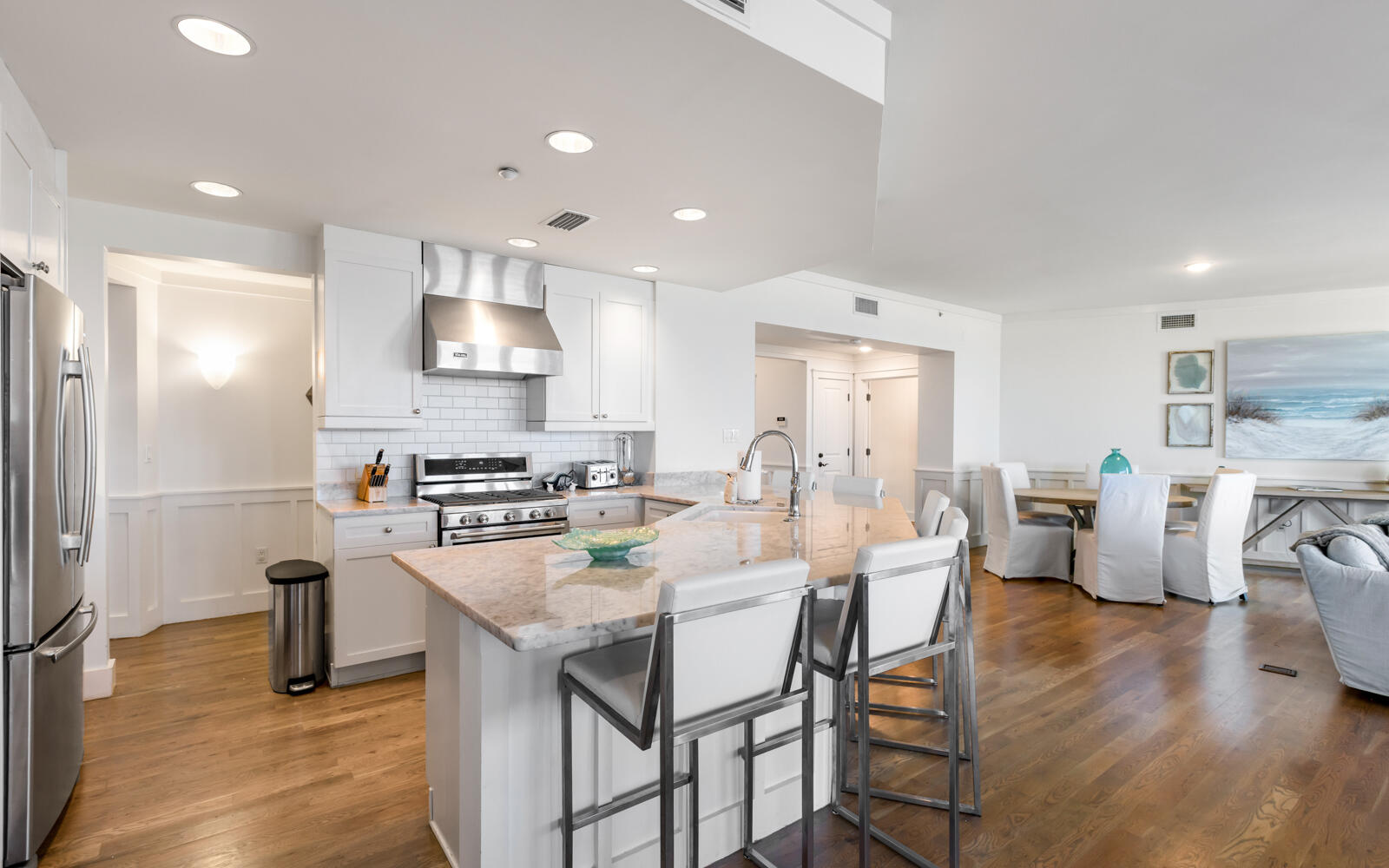 100 Bridge Lane, Unit 214C Inlet Beach, FL 32461 - Photo 16 of 54 a kitchen with stainless steel appliances granite countertop a stove a refrigerator a kitchen island a sink and a refrigerator