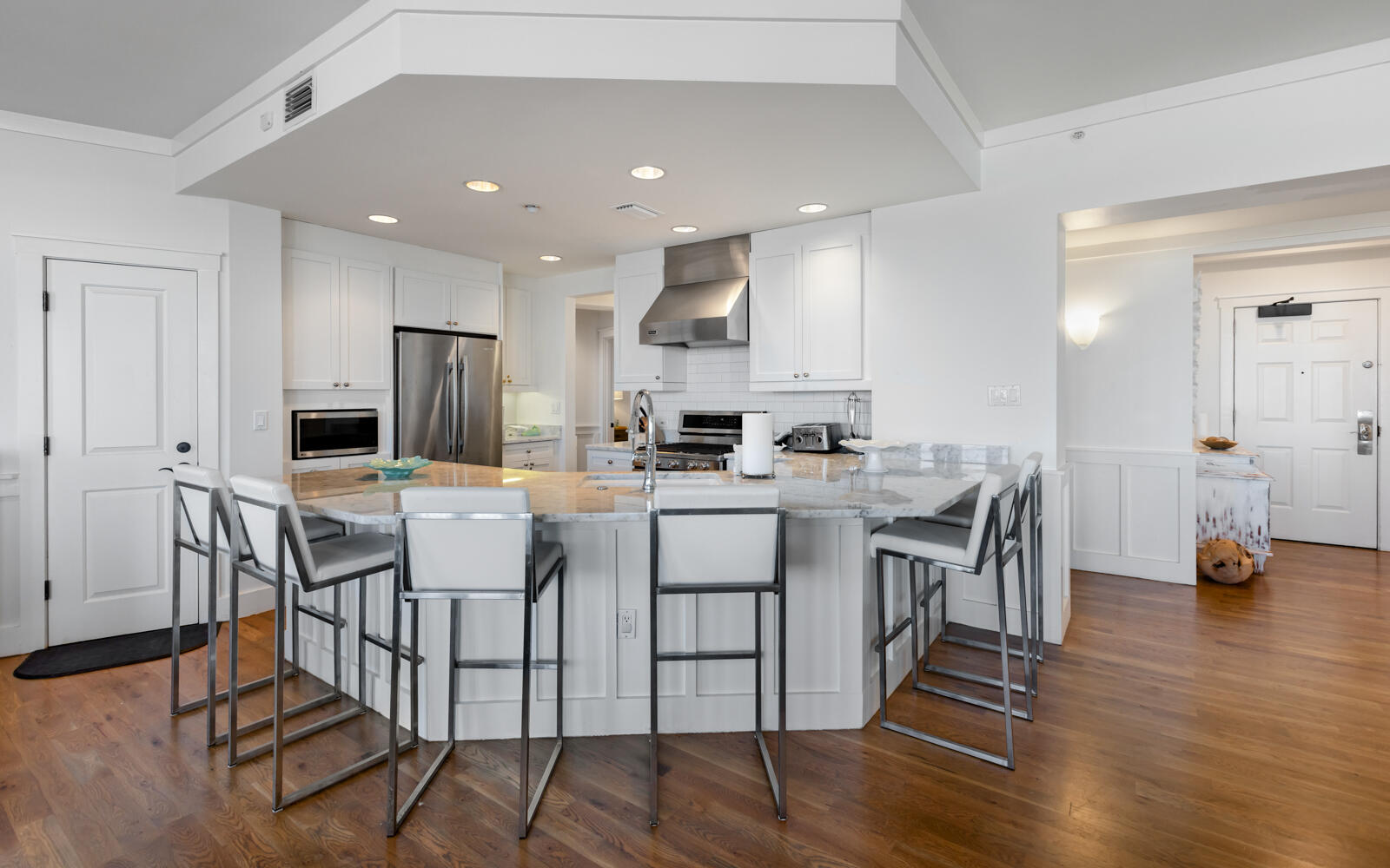 100 Bridge Lane, Unit 214C Inlet Beach, FL 32461 - Photo 18 of 54 a kitchen with stainless steel appliances kitchen island granite countertop a stove a sink a refrigerator and a microwave
