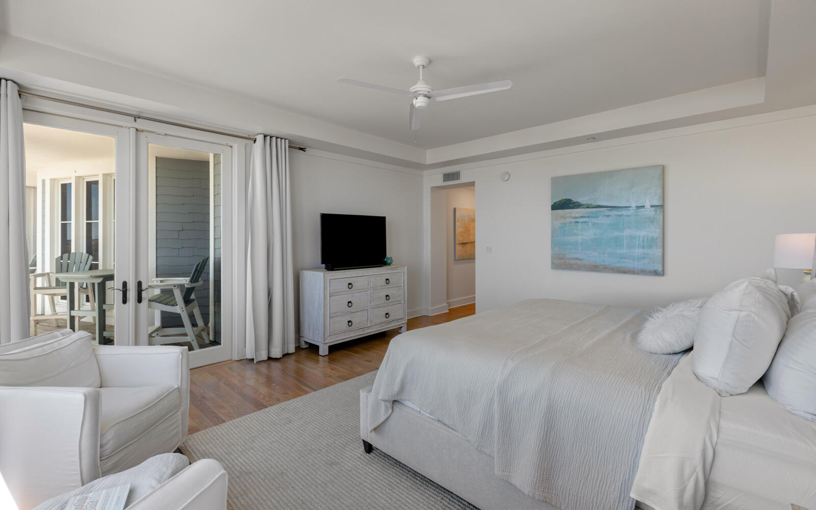 100 Bridge Lane, Unit 214C Inlet Beach, FL 32461 - Photo 22 of 54 a bedroom with a bed and a flat screen tv