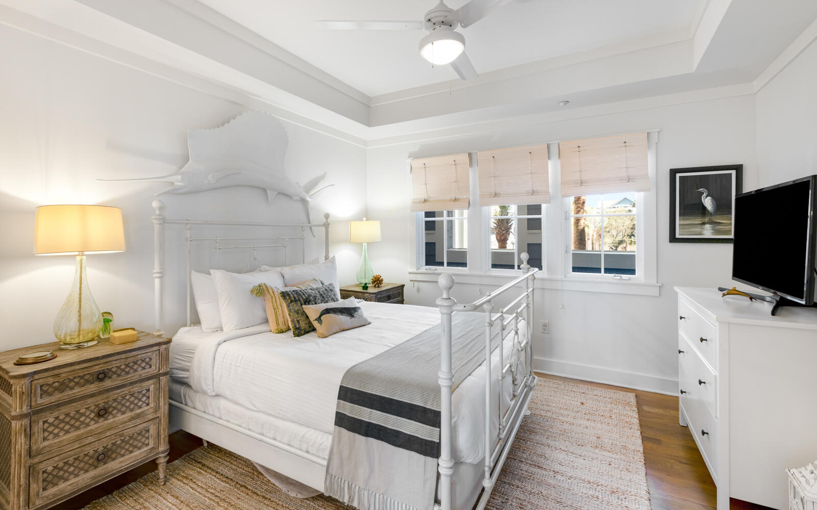 100 Bridge Lane, Unit 214C Inlet Beach, FL 32461 - Photo 30 of 54 a bedroom with a bed and a flat tv screen on dresser