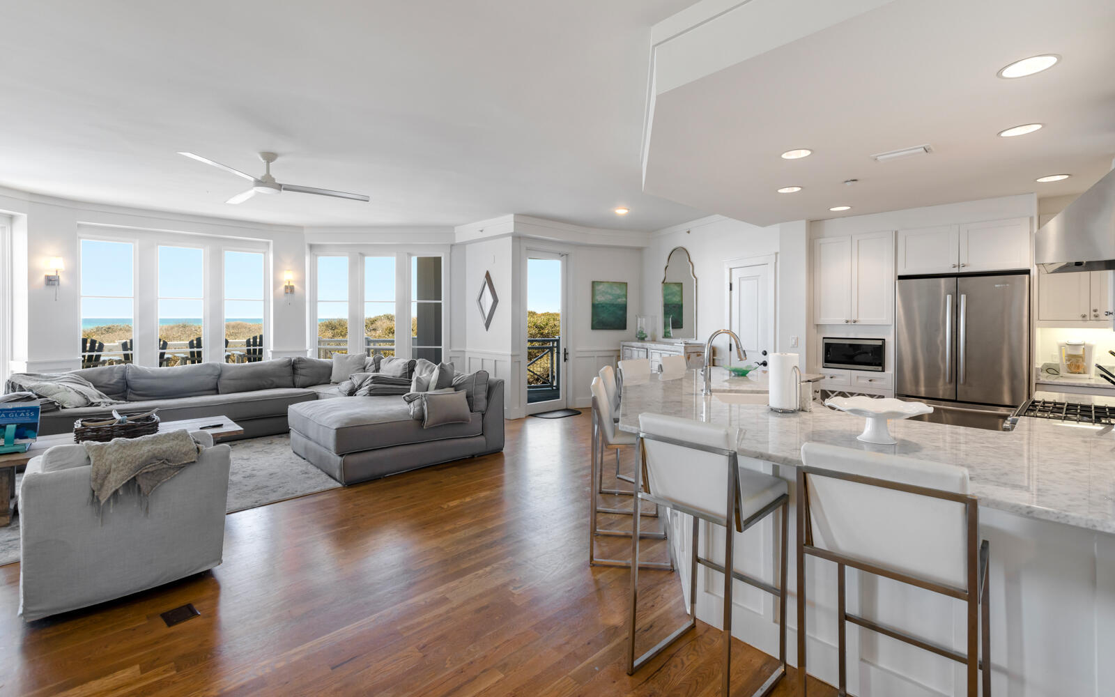 100 Bridge Lane, Unit 214C Inlet Beach, FL 32461 - Photo 3 of 54 a living room kitchen with furniture and a wooden floor