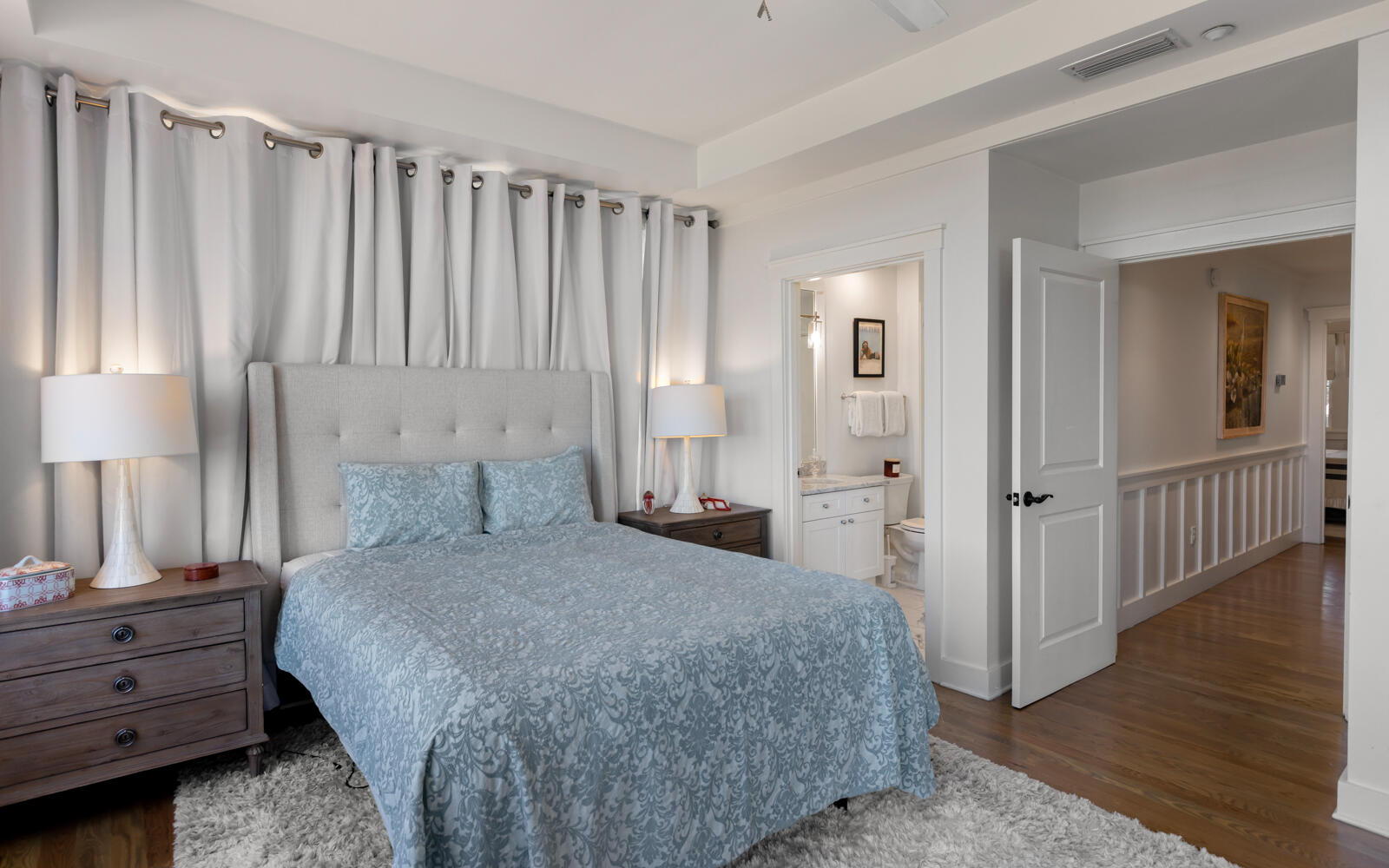 100 Bridge Lane, Unit 214C Inlet Beach, FL 32461 - Photo 35 of 54 a bedroom with a bed and a mirror