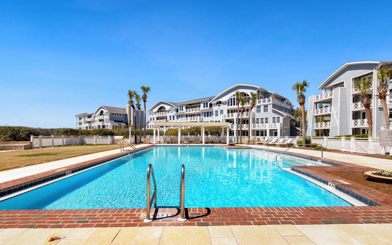 100 Bridge Lane, Unit 214C Inlet Beach, FL 32461 - Photo 50 of 54 a view of a swimming pool with a lounge chairs
