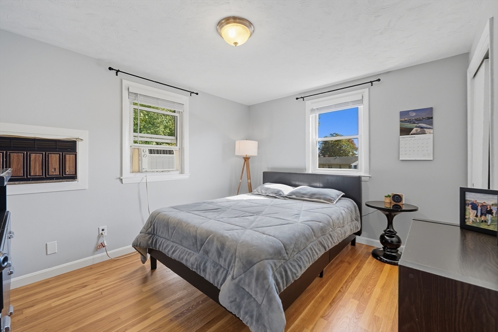 35 Oak Ridge Circle Lynn, MA 01904 - Photo 24 of 37 a bedroom with a bed and a desk