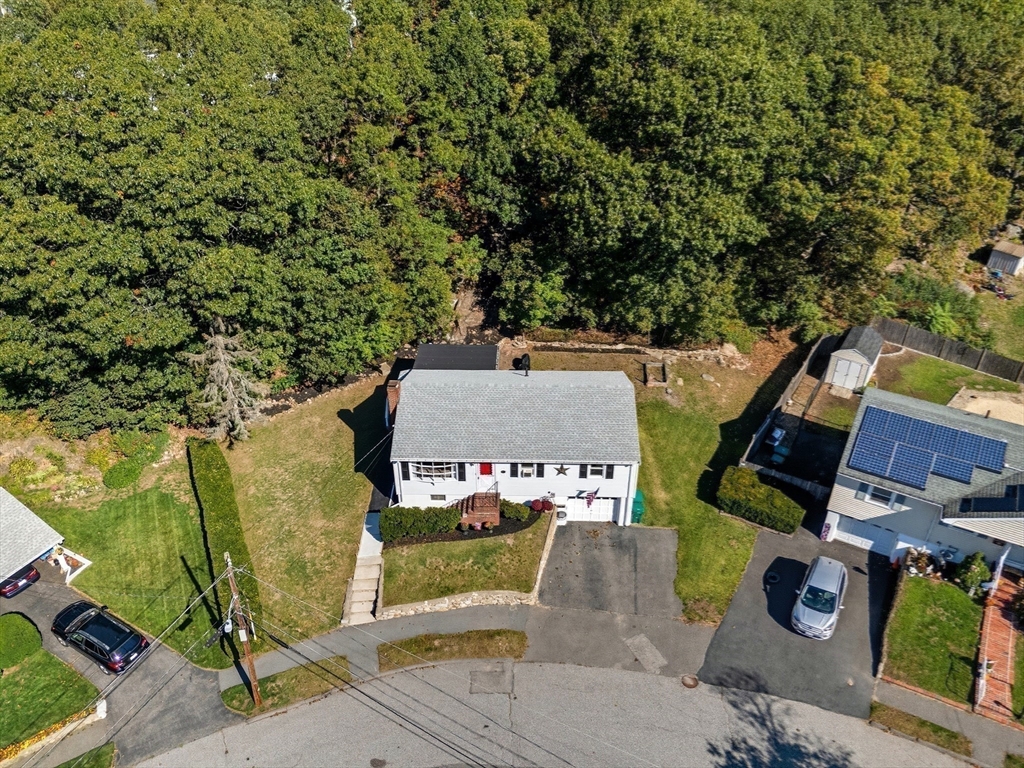 35 Oak Ridge Circle Lynn, MA 01904 - Photo 33 of 37 an aerial view of a house with swimming pool