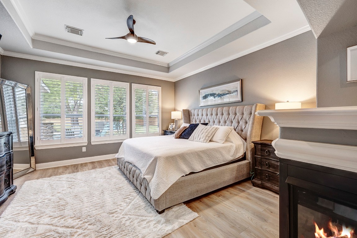 2600 Silverstone Way Conroe, TX 77304 - Photo 21 of 49 a bedroom with a large bed and a window