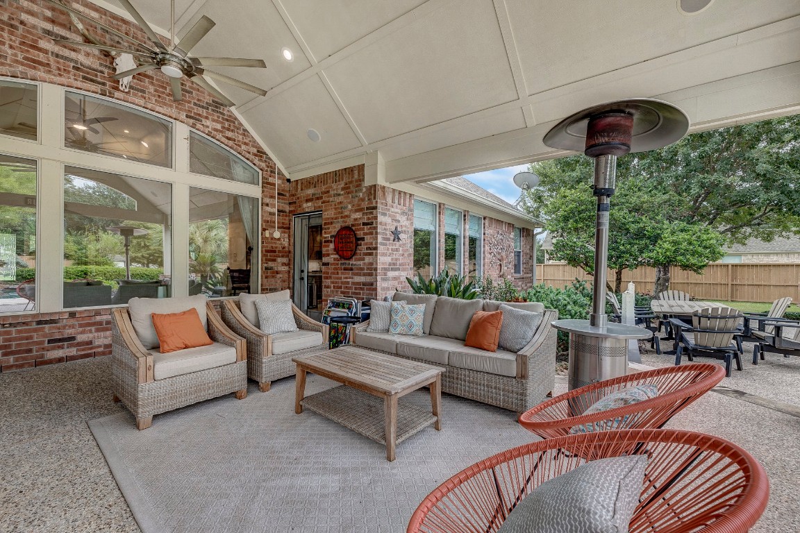 2600 Silverstone Way Conroe, TX 77304 - Photo 38 of 49 a outdoor living space with patio furniture and a potted plants