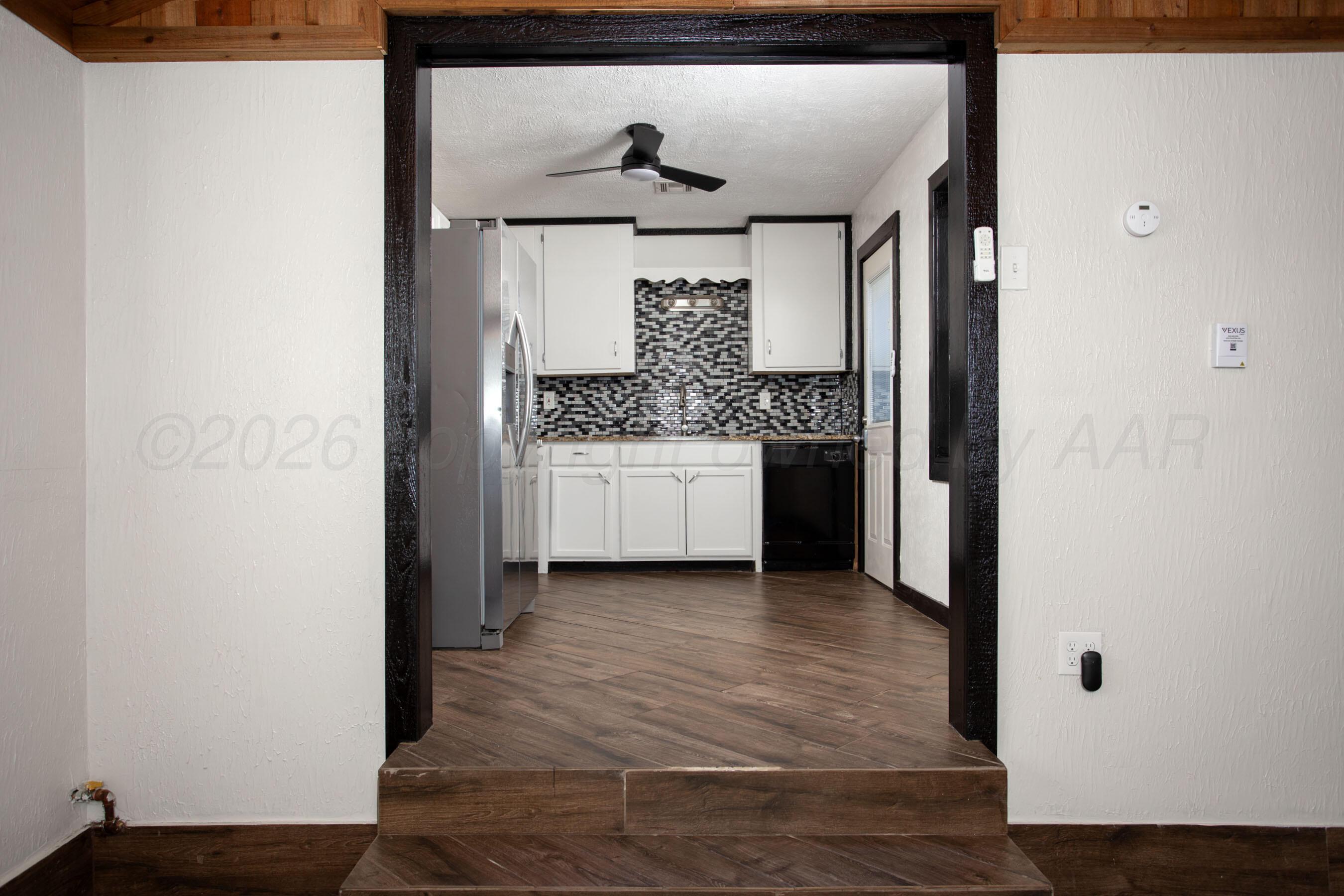 4612 Cline Road Amarillo, TX 79110 - Photo 13 of 40 Doorway from Bonus Room to Kitchen