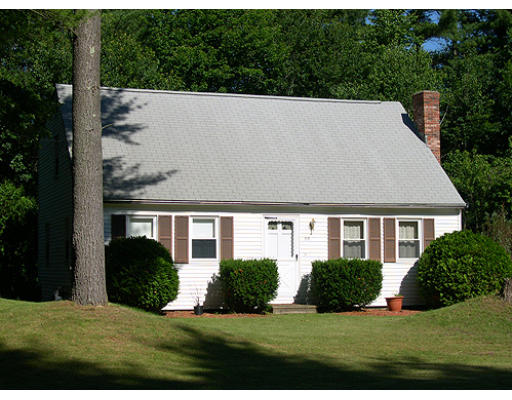a view of house with yard