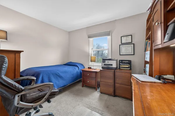 a room with furniture and screen