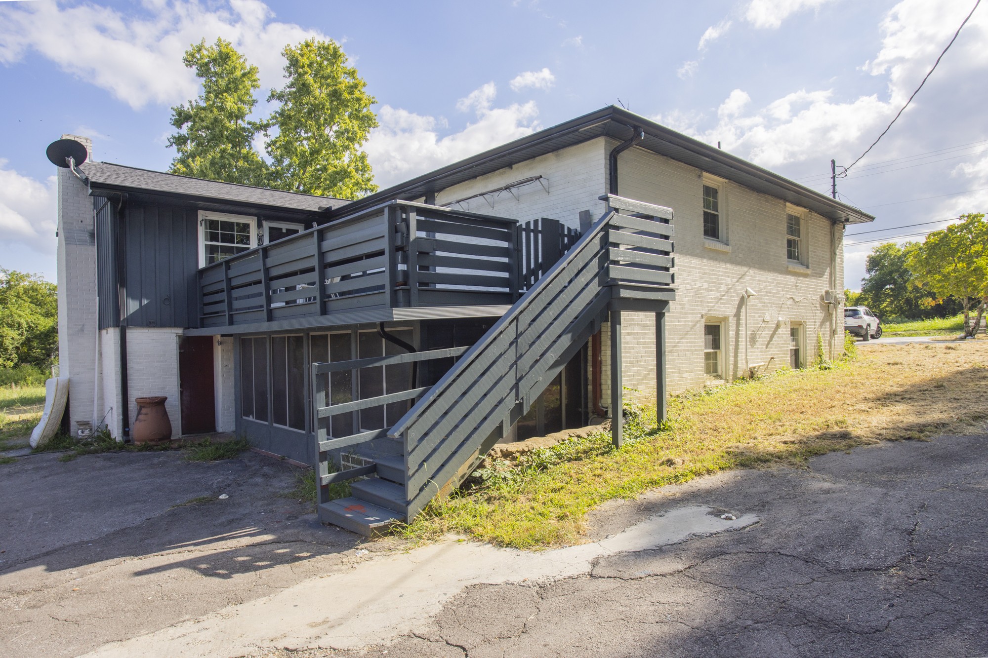 1717 Hudson Road, Unit B Madison, TN 37115 - Photo 2 of 6 a front view of a house with a yard
