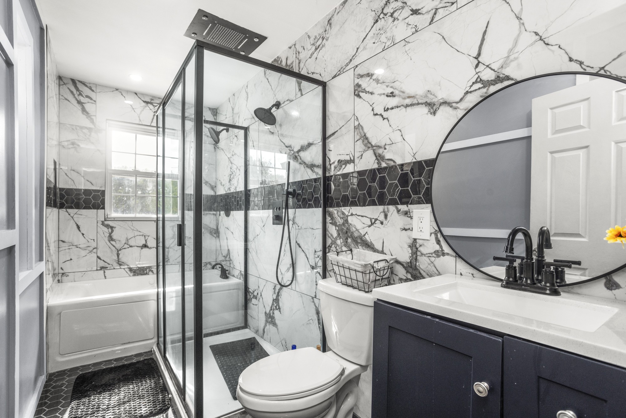 1717 Hudson Road, Unit B Madison, TN 37115 - Photo 3 of 6 a bathroom with a sink a toilet and shower