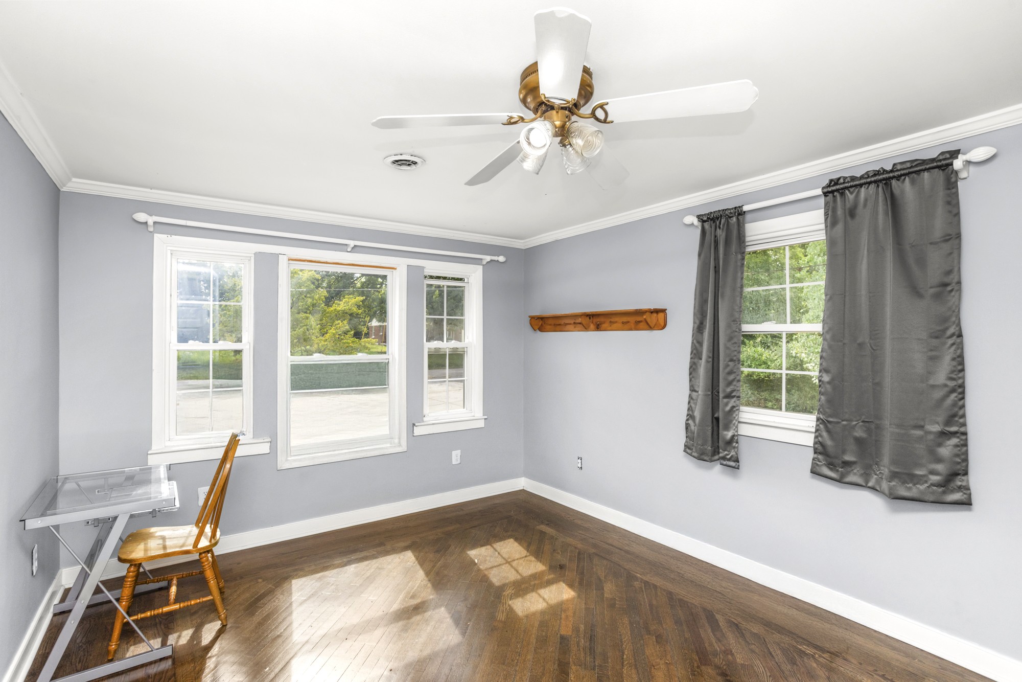 1717 Hudson Road, Unit B Madison, TN 37115 - Photo 4 of 6 a view of a livingroom with wooden floor and a window