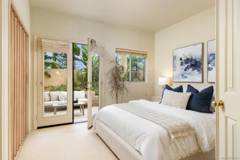 a bathroom with a sink and mirror with toilet