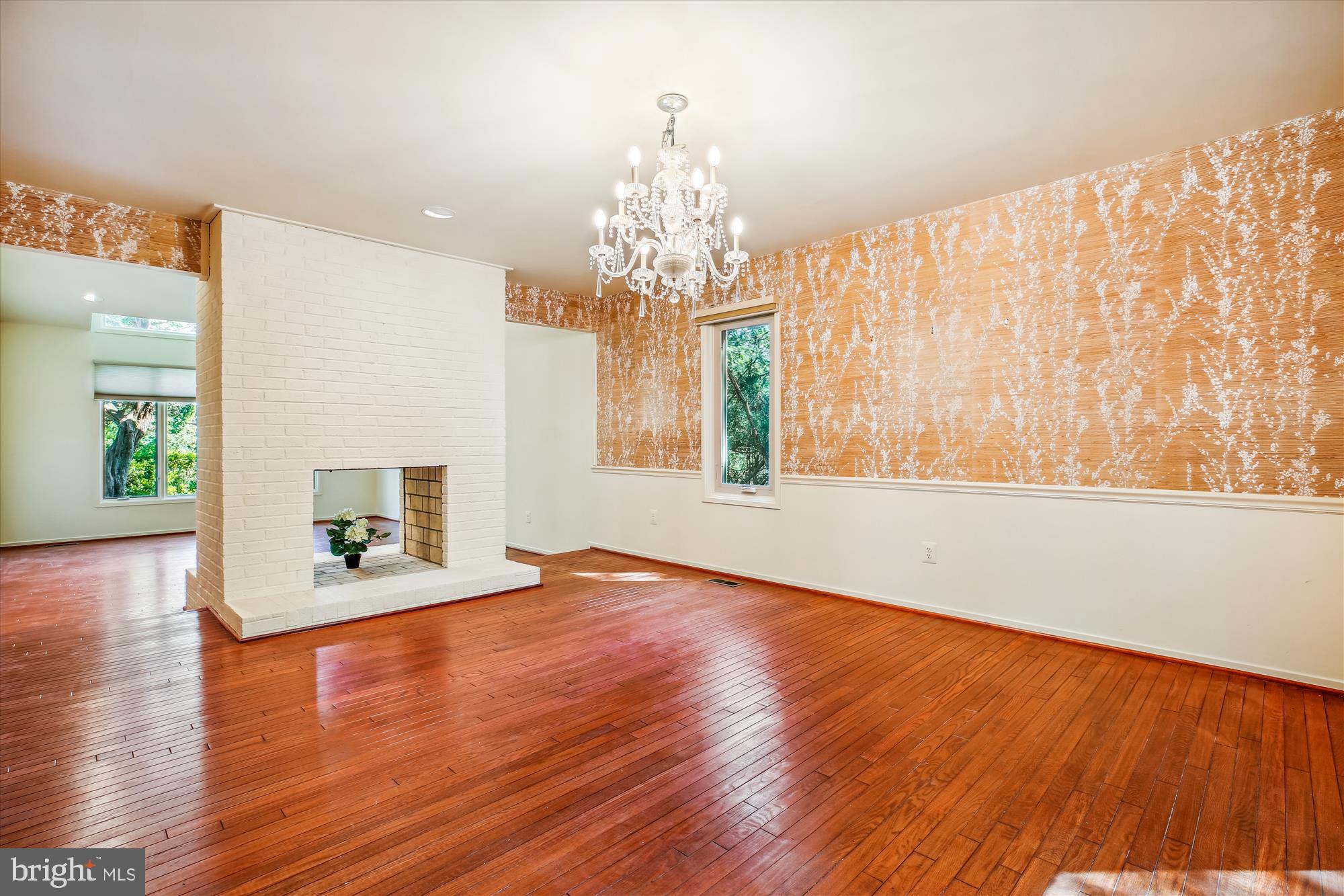 7922 Springer Road Bethesda, MD 20817 - Photo 16 of 58 Formal Dining Room with a Dual Sided Fireplace