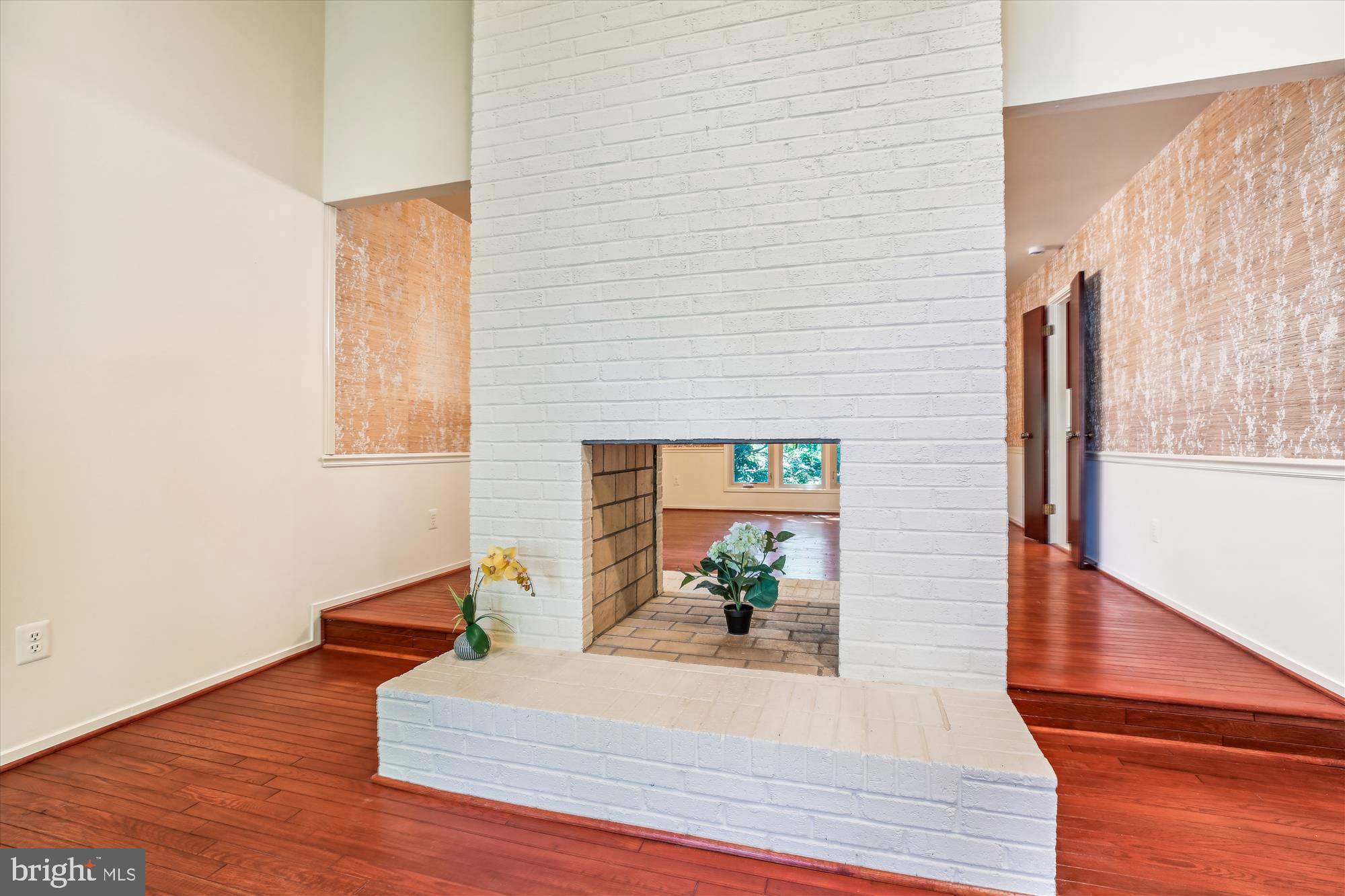 7922 Springer Road Bethesda, MD 20817 - Photo 18 of 58 Architectural Focal Point: Dual-Sided Fireplace