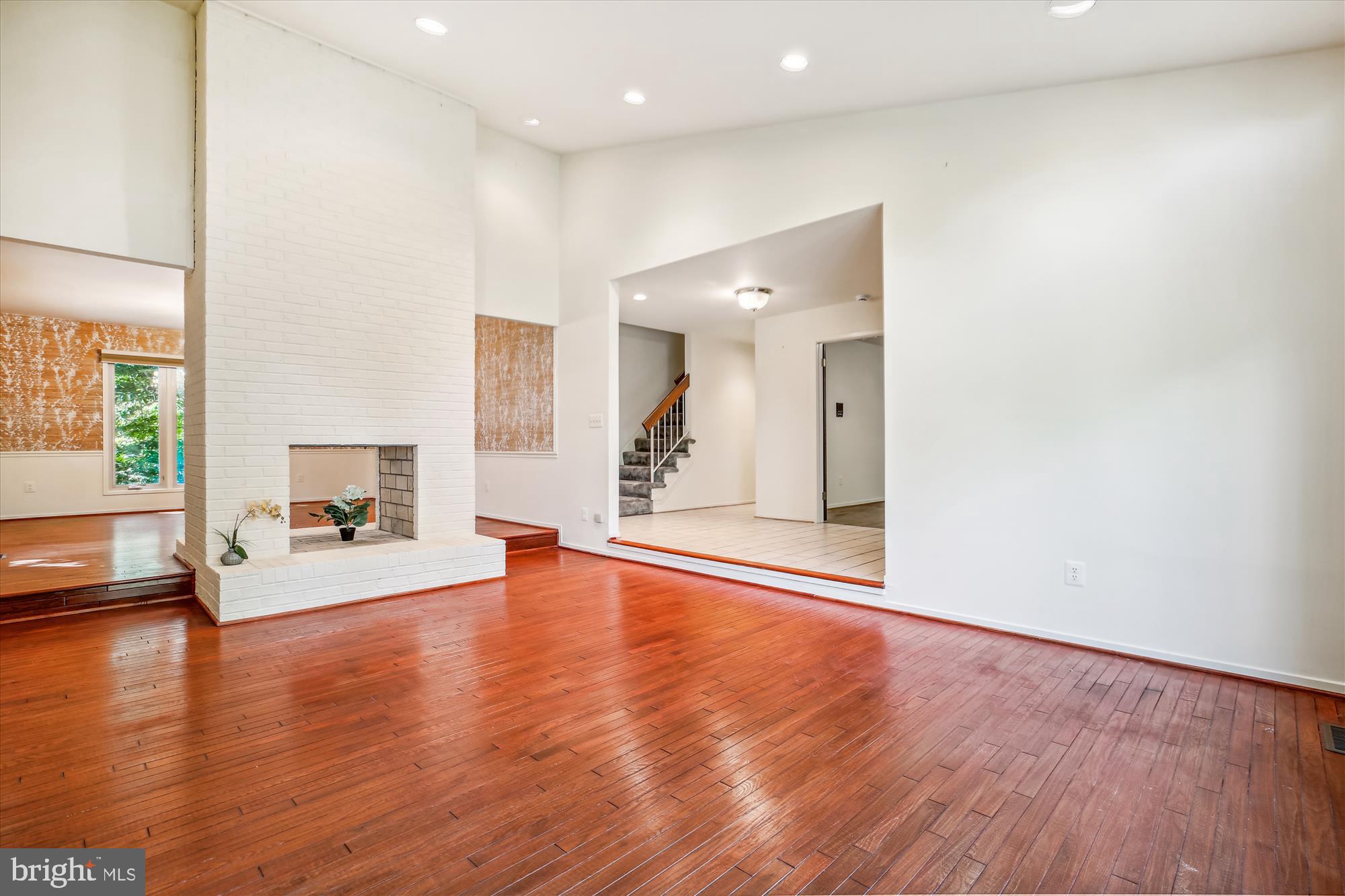7922 Springer Road Bethesda, MD 20817 - Photo 19 of 58 Living Room with a Dual Sided Fireplace