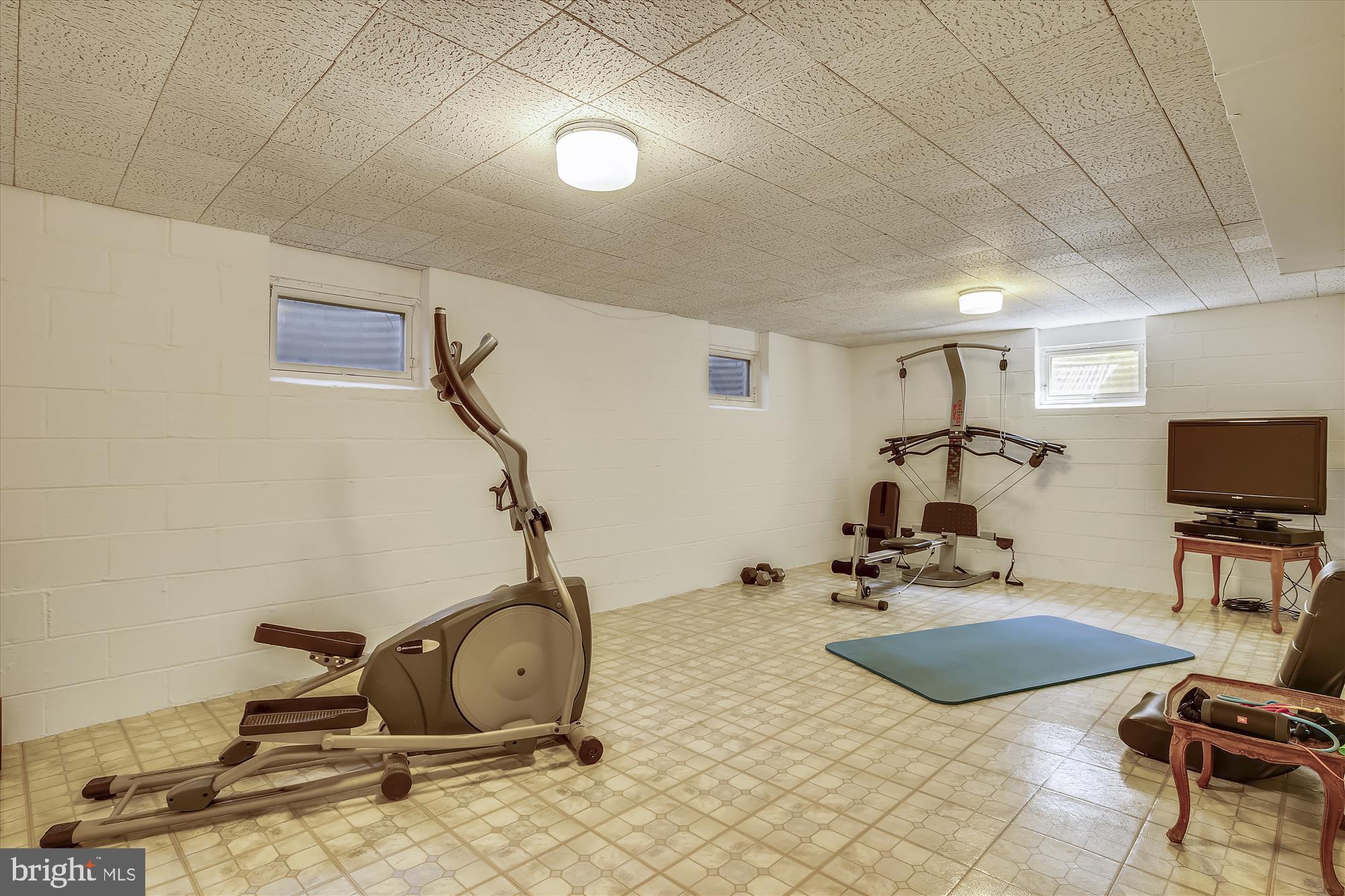 7107 Devonshire Road Alexandria, VA 22307 - Photo 33 of 42 Finished rec room w/ high ceilings in basement