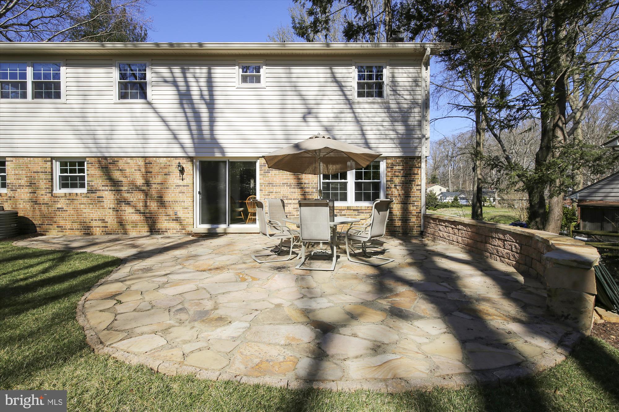 7107 Devonshire Road Alexandria, VA 22307 - Photo 34 of 42 Flagstone patio w/ a surround knee wall