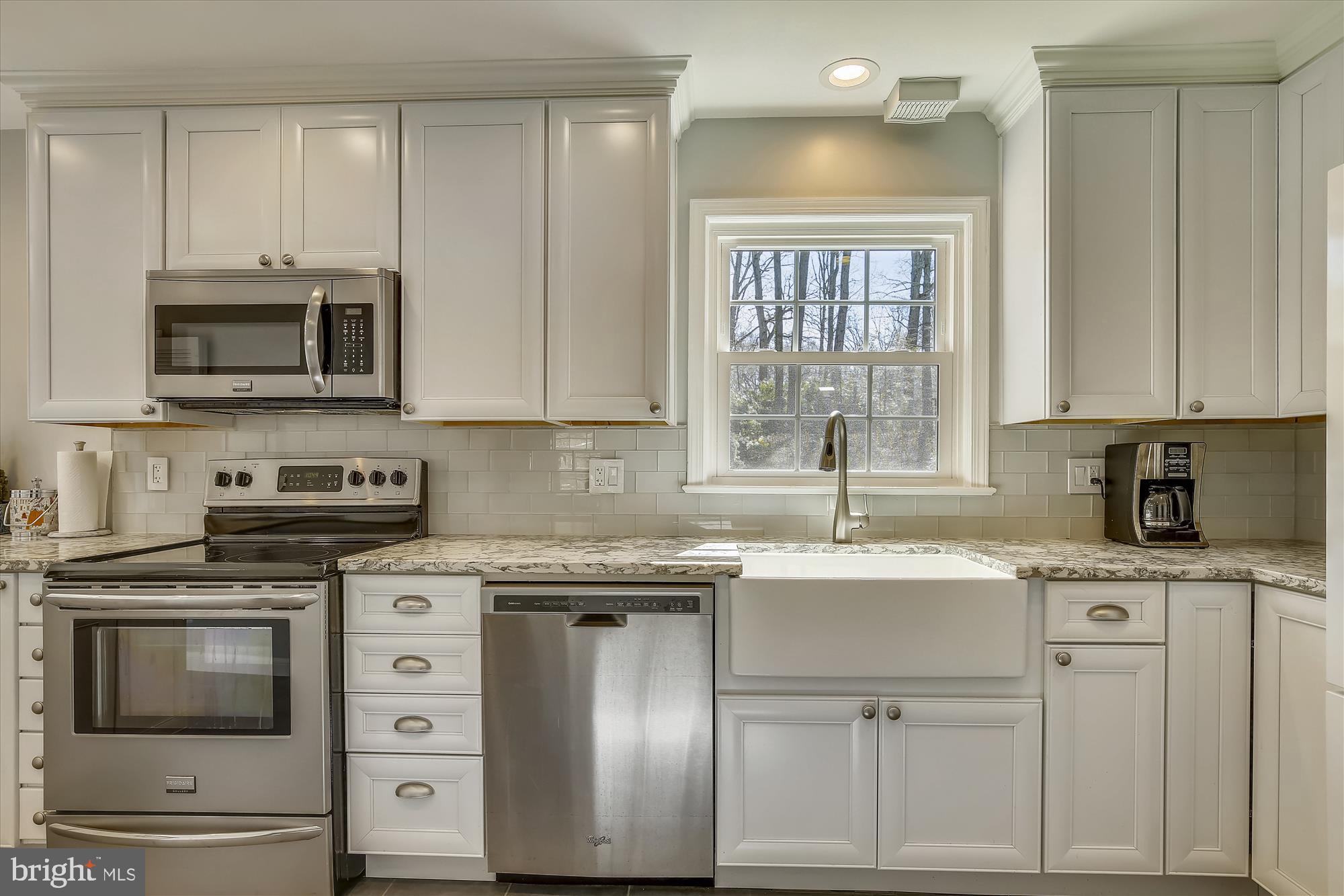 7107 Devonshire Road Alexandria, VA 22307 - Photo 9 of 42 Soft-close cabinetry w/ deep farm sink