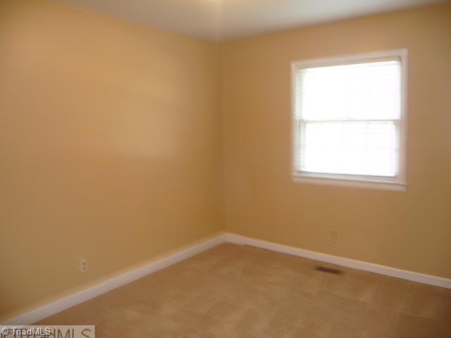 907 Oakview Road High Point, NC 27265 - Photo 9 of 14 2nd Bedroom. Brand new paint and carpet.
