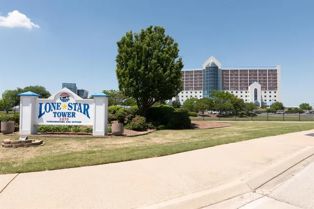a view of swimming pool with a yard and plants