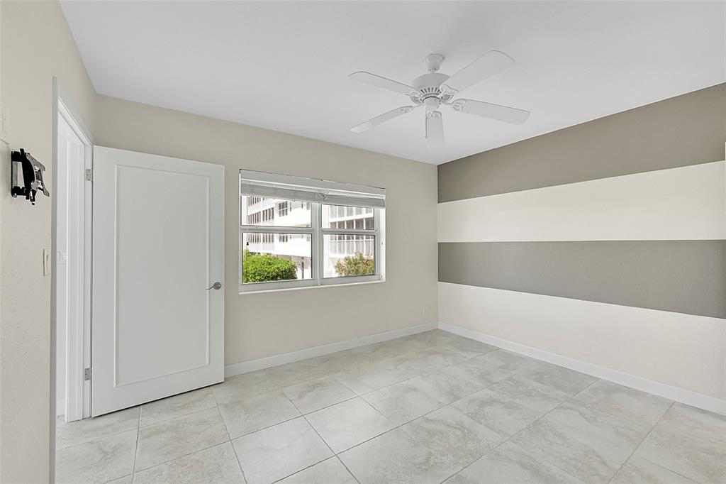 1530 South Ocean Boulevard, Unit 12 Lauderdale-by-the-Sea, FL 33062 - Photo 21 of 81 a view of an empty room with a window