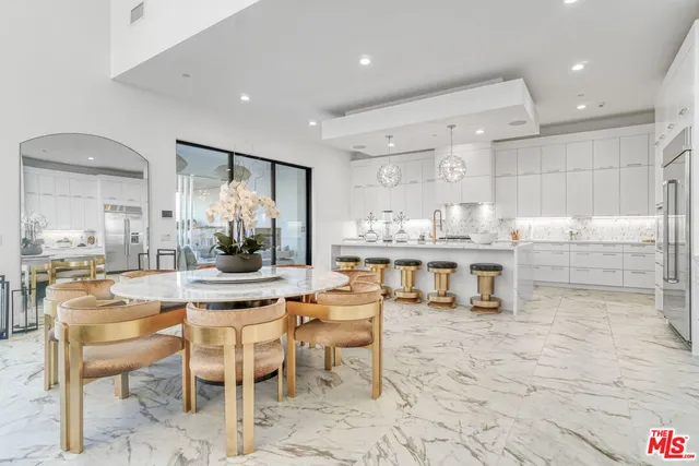 a kitchen with counter top space and appliances