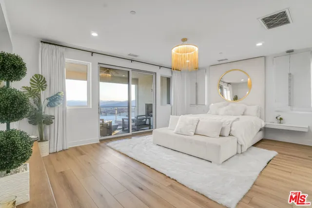 a view of a kitchen with a sink