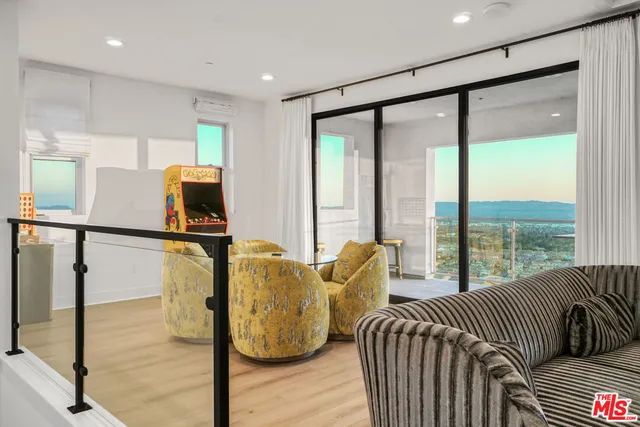 a view of swimming pool with outdoor seating