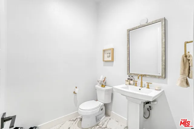 a view of swimming pool with outdoor seating and city view