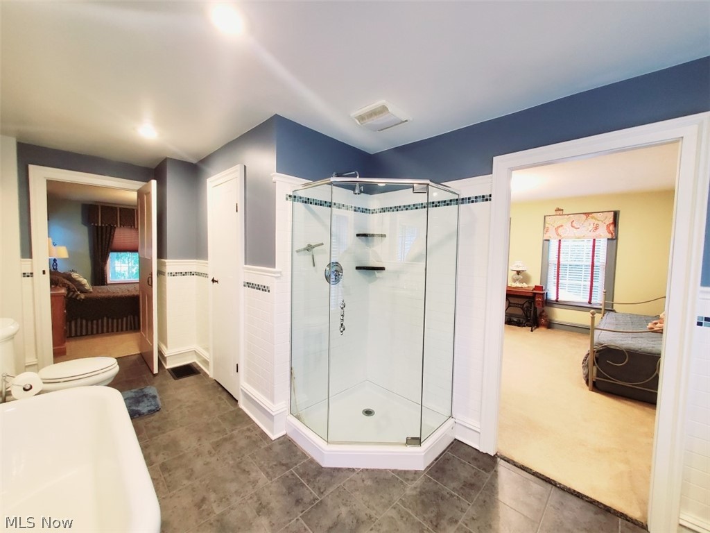12703 Sheldon Road Mantua, OH 44255 - Photo 23 of 35 Corner shower and soaking tub can be shared by both bedrooms.